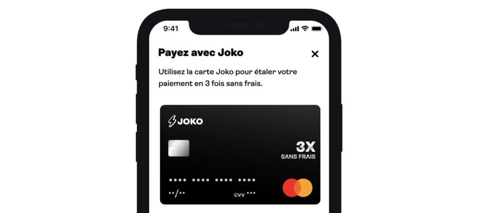 Avis sur l'application Joko qui améliore le pouvoir d'achat grâce à un téléphone avec une carte de crédit affichée.