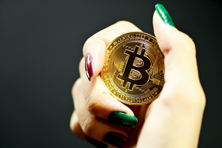 gold and black round coin